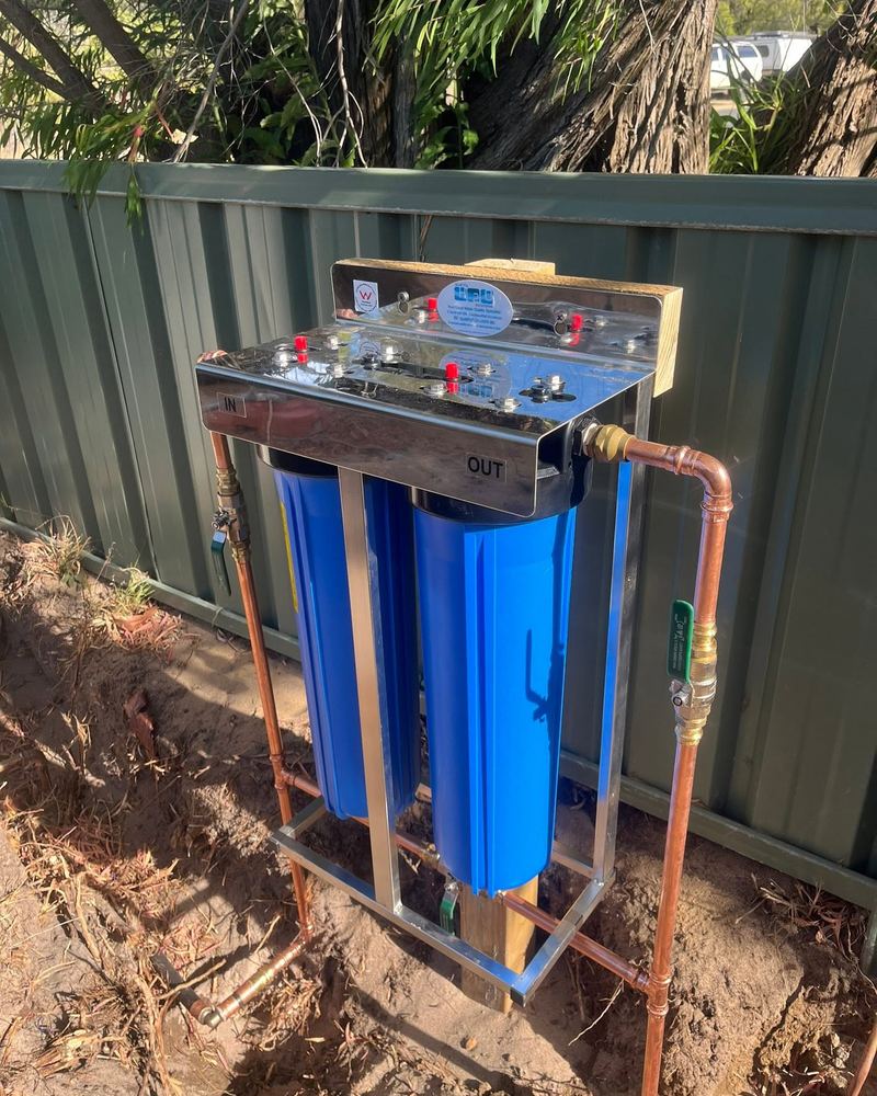 Whole-house water filter installed with copper pipework